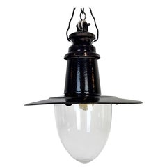Lámpara colgante industrial alemana de esmalte negro con cubierta de cristal, años 30