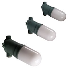 Antique Taito Oy, set of three green 1930's cast iron industrial wall lamps