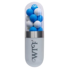 "Fancy! WTF (His)" - Blue & White Glass Pill Wall Sculpture by Edie Nadelhaft