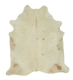 Rug & Kilim’s Extra Large Cowhide Rug in Beige, White and Cream Tones
