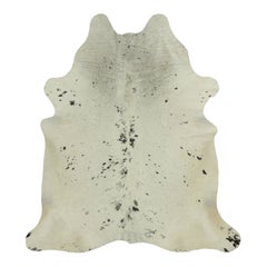 Rug & Kilim’s Extra Large Cowhide Rug in Black, White and Cream Tones