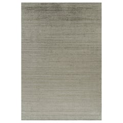 Tapis texturé surdimensionné de Rug & Kilim, avec des tons verts de Sage et des rayures.
