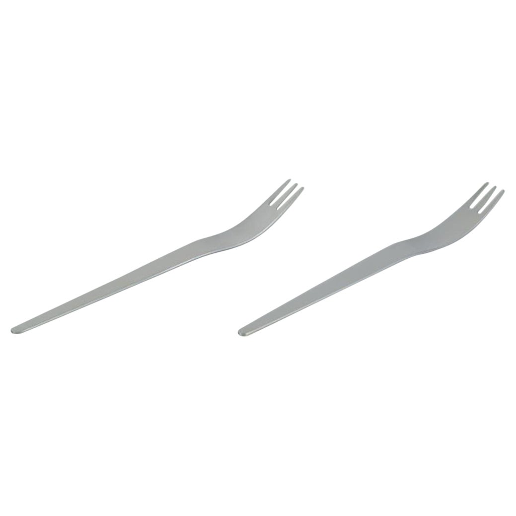 Arne Jacobsen para Georg Jensen. Dos tenedores largos para ensalada de acero inoxidable.