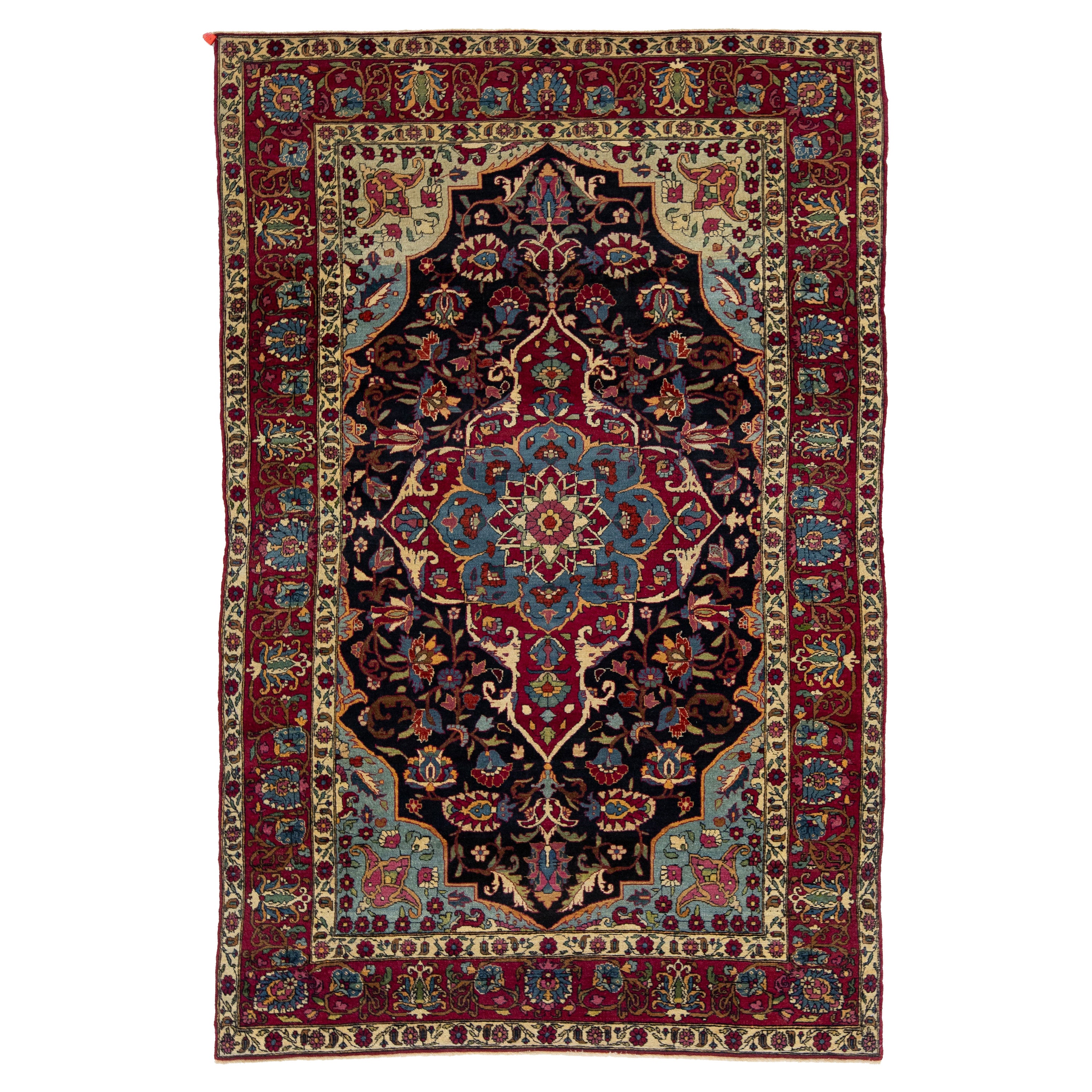 Antique Kerman Persian Dark Blue Wool Rug with a Medallion Floral Design For Sale