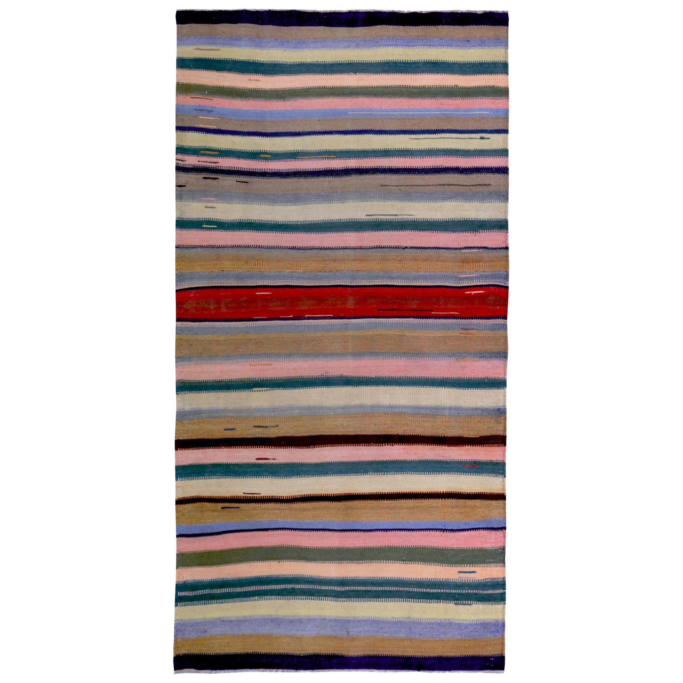 Petit tapis persan Kilim datant d'environ 1910, motif en laine bleu rose rouge - 89382