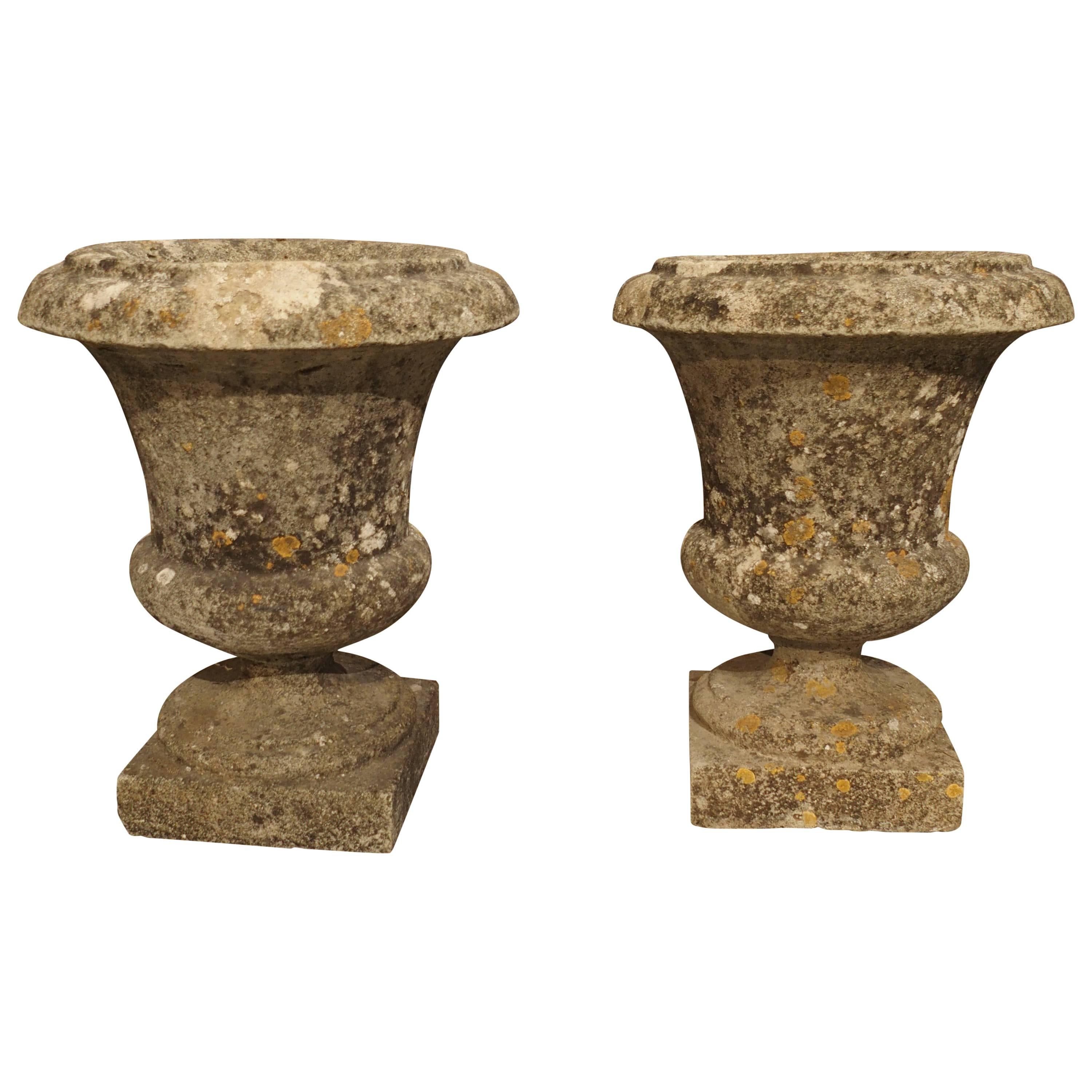 Pair of Small Reconstituted Stone Urns from France