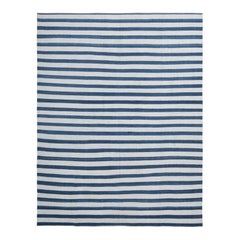 Rug & Kilim’s Contemporary Dhurrie Rug in Navy Blue and Off-White Stripes