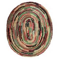 Antique Hooked Oval Rug with Polychromatic Geometric Patterns  Rug & Kilim
