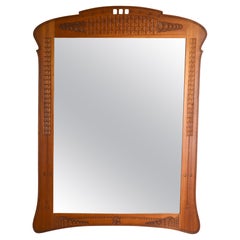 Antique Art Nouveau mirror in finely chiseled wood