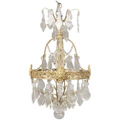 Early 20th Century Gilt Bronze and Crystal Eight-Light Chandelier