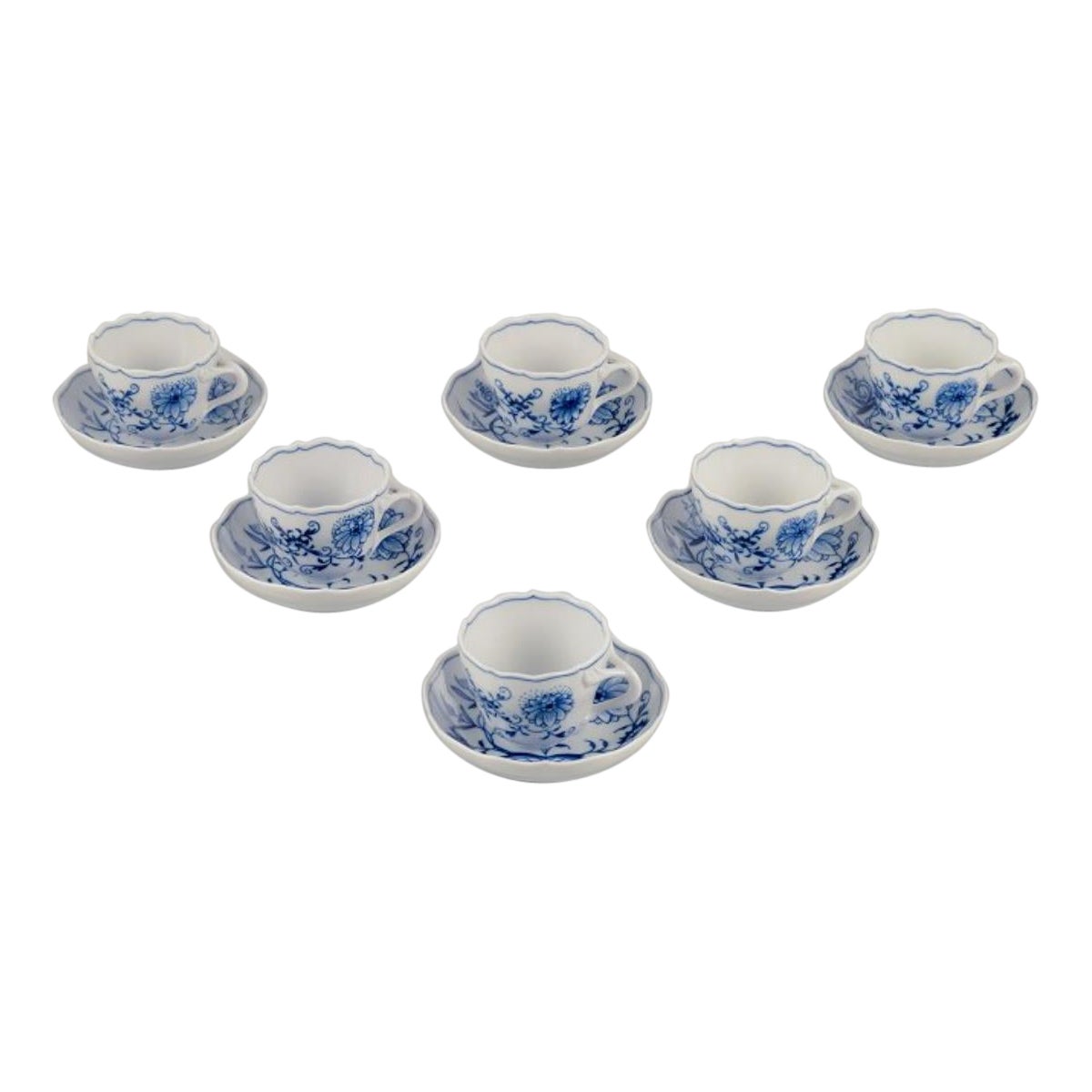 Meissen, Germany. Six Blue Onion demitasse cups with saucers in porcelain.