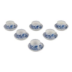 Meissen, Germany. Six Blue Onion demitasse cups with saucers in porcelain.