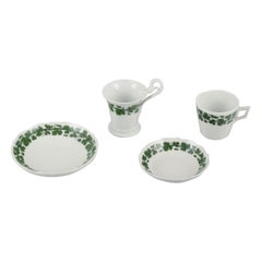 Meissen, Germany, Green Ivy Vine, two porcelain coffee cups with saucers.