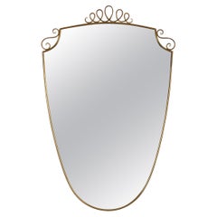 Gio Ponti style brass frame mirror. Italy c1950