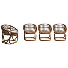 Set di 4 poltrone in bambù intrecciato nello stile di Tito Agnoli, anni '70