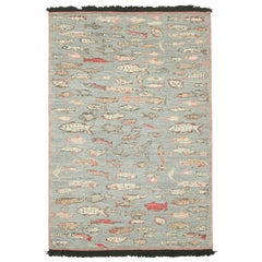 Rug & Kilim’s Pictorial Art Rug in Blue with Polychromatic Fish Illustrations