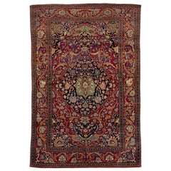 Antique Kerman Persian Red Wool Rug with a Rosette Motif