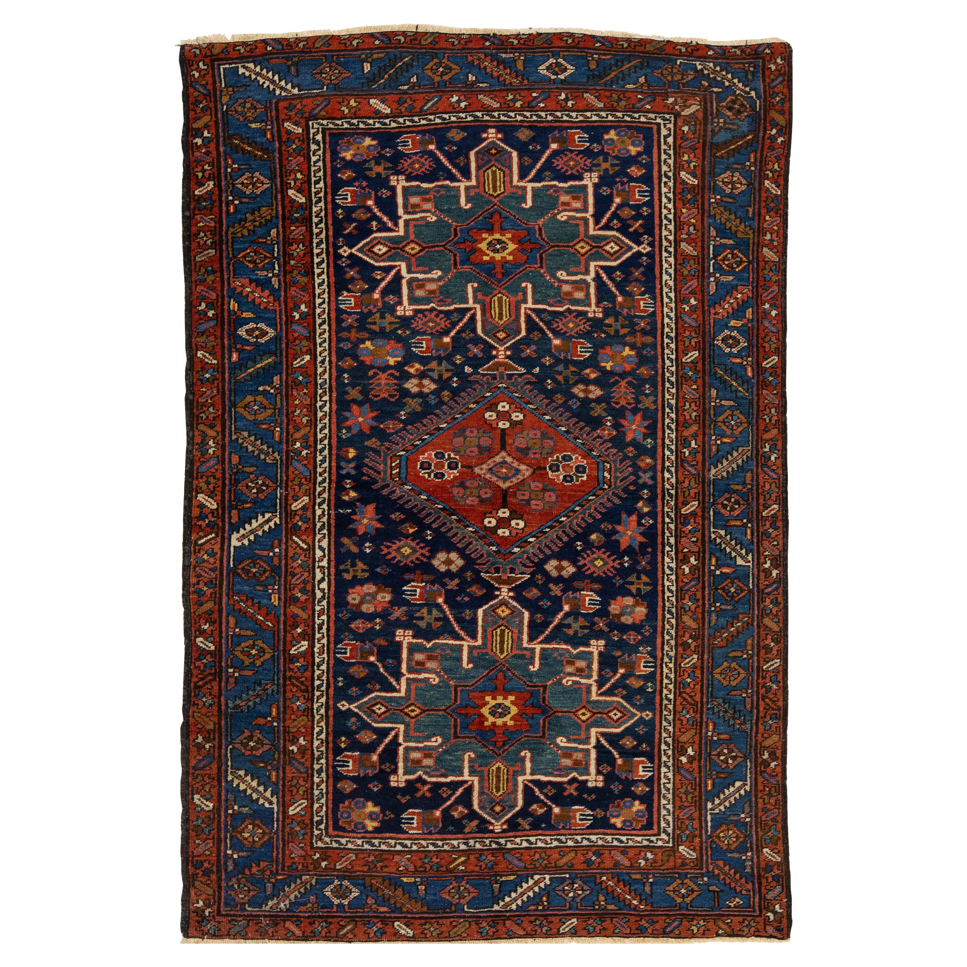 Antique Persian Heriz Wool Rug Handmade In Navy Blue With Tribal Design For Sale