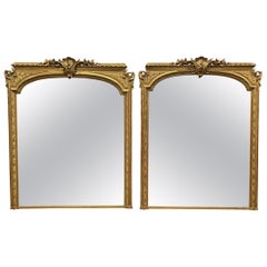 Pair of 19th Century Gilt overmantel mirrors with original plate mirrors