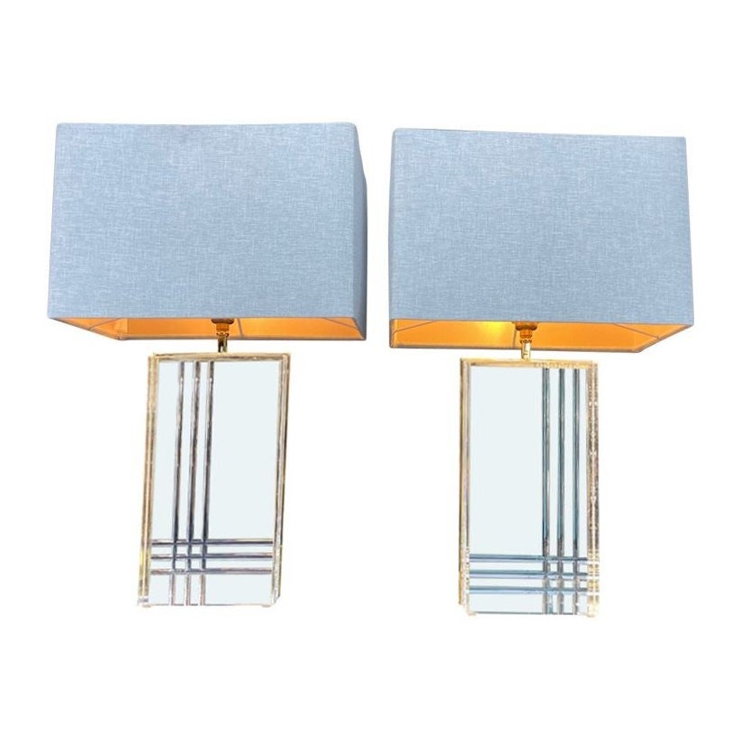 A pair of 1970s Italian gilt metal and lucite lamps