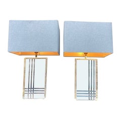 A pair of 1970s Italian gilt metal and lucite lamps