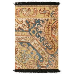 Rug & Kilim’s Dragon Rug in Gold and Blue with Geometric-Floral Patterns