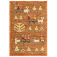 Rug & Kilim's Swedish Style Rug in Brown with Figural Geometric Patterns (tapis de style suédois à motifs géométriques figuratifs)