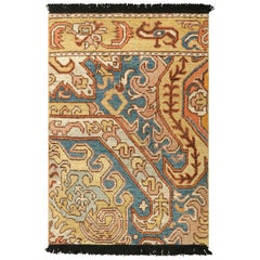 Rug & Kilim’s Dragon Rug in Gold and Blue with Geometric-Floral Patterns