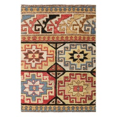 Tapis tribal à motifs géométriques primitivistes de Rug & Kilim