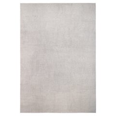 Alfombra minimalista de lana tejida a mano de color topo 13'10''x20'1''