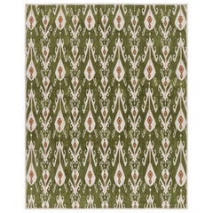 Rug & Kilim’s Contemporary Dhurrie Rug in Green with White & Pink Ikats Pattern