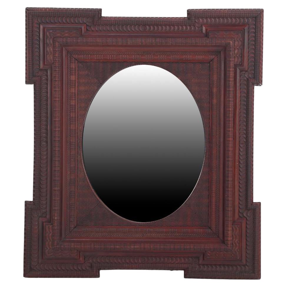 A French mahogany Dutch Ripple style mirror, C 1890.