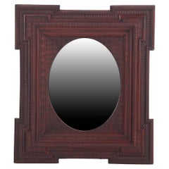 Antique A French mahogany Dutch Ripple style mirror, C 1890.