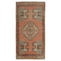 Tappeto turco vintage rosa e crema con medaglione geometrico  Rug & Kilim