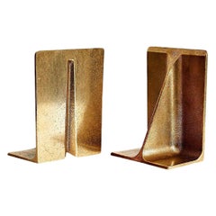 Pareja de 2 pequeños sujetalibros estructurales de viga en I de bronce dorado de Henry Wilson