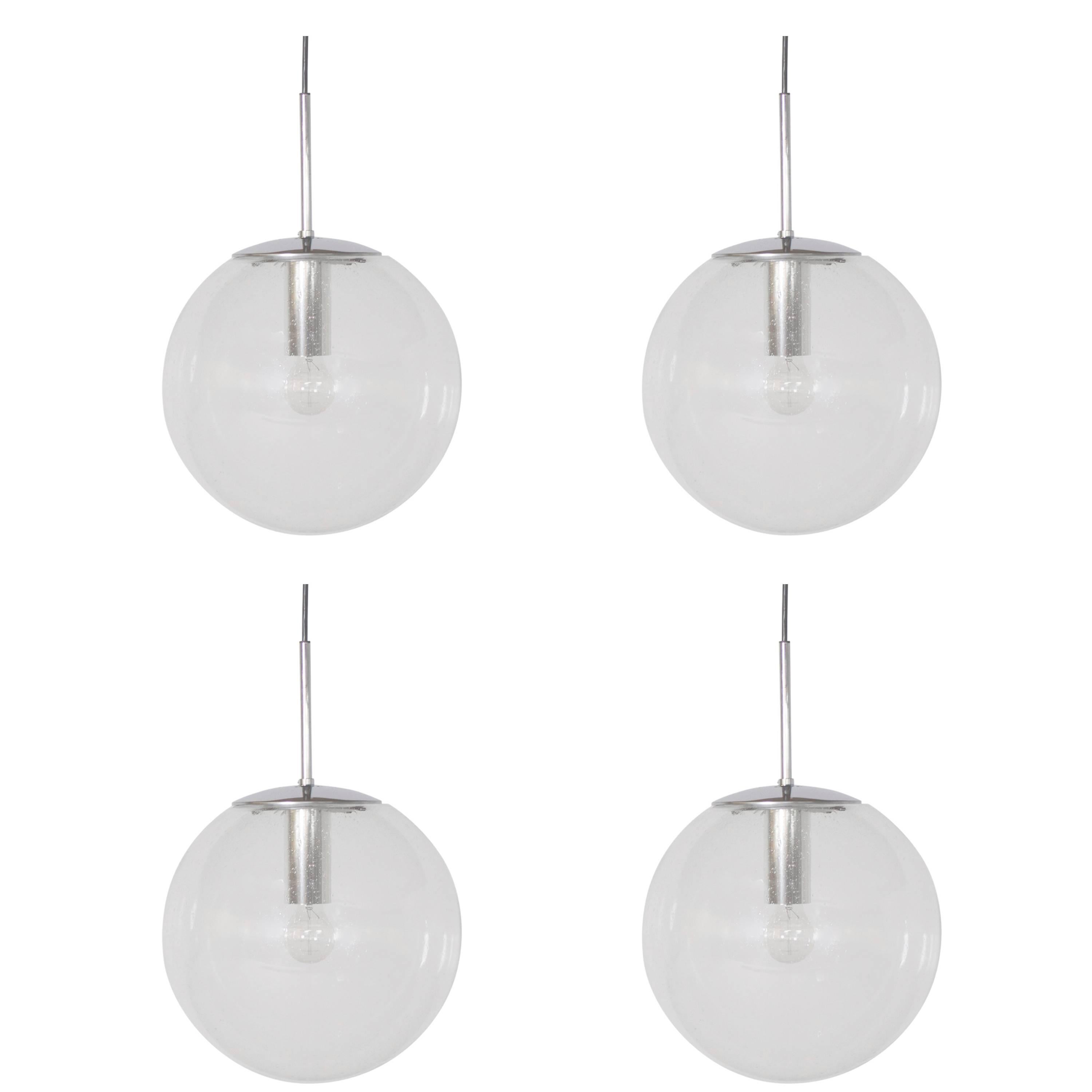 Four Large Glashütte Limburg Globe Pendants