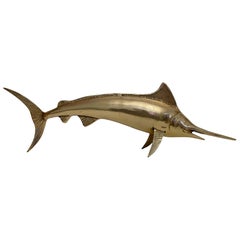 Escultura de latón con cuerpo de Marlin