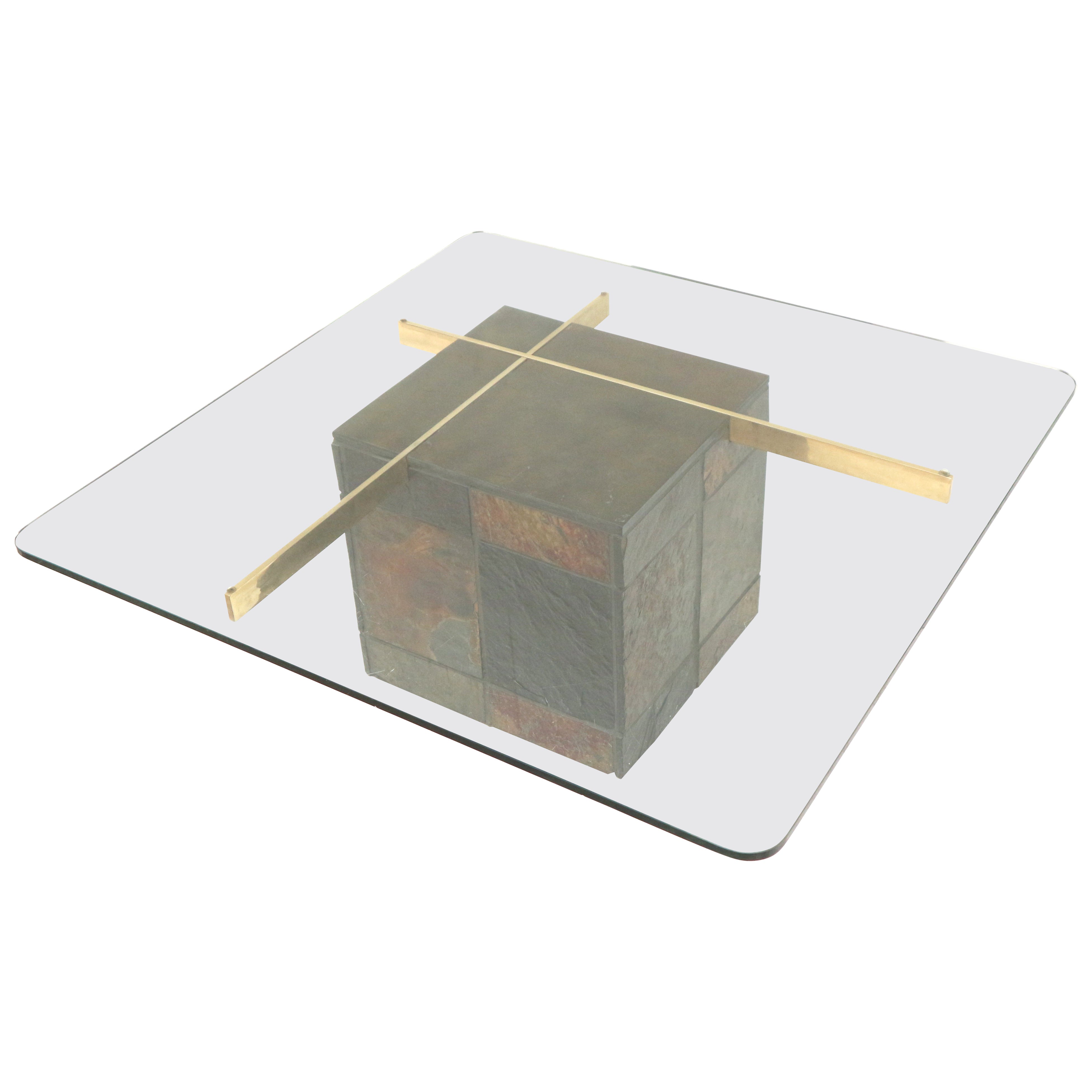 Mesa de centro de diseño italiano de Artedi con base de piedra natural y tapa de cristal