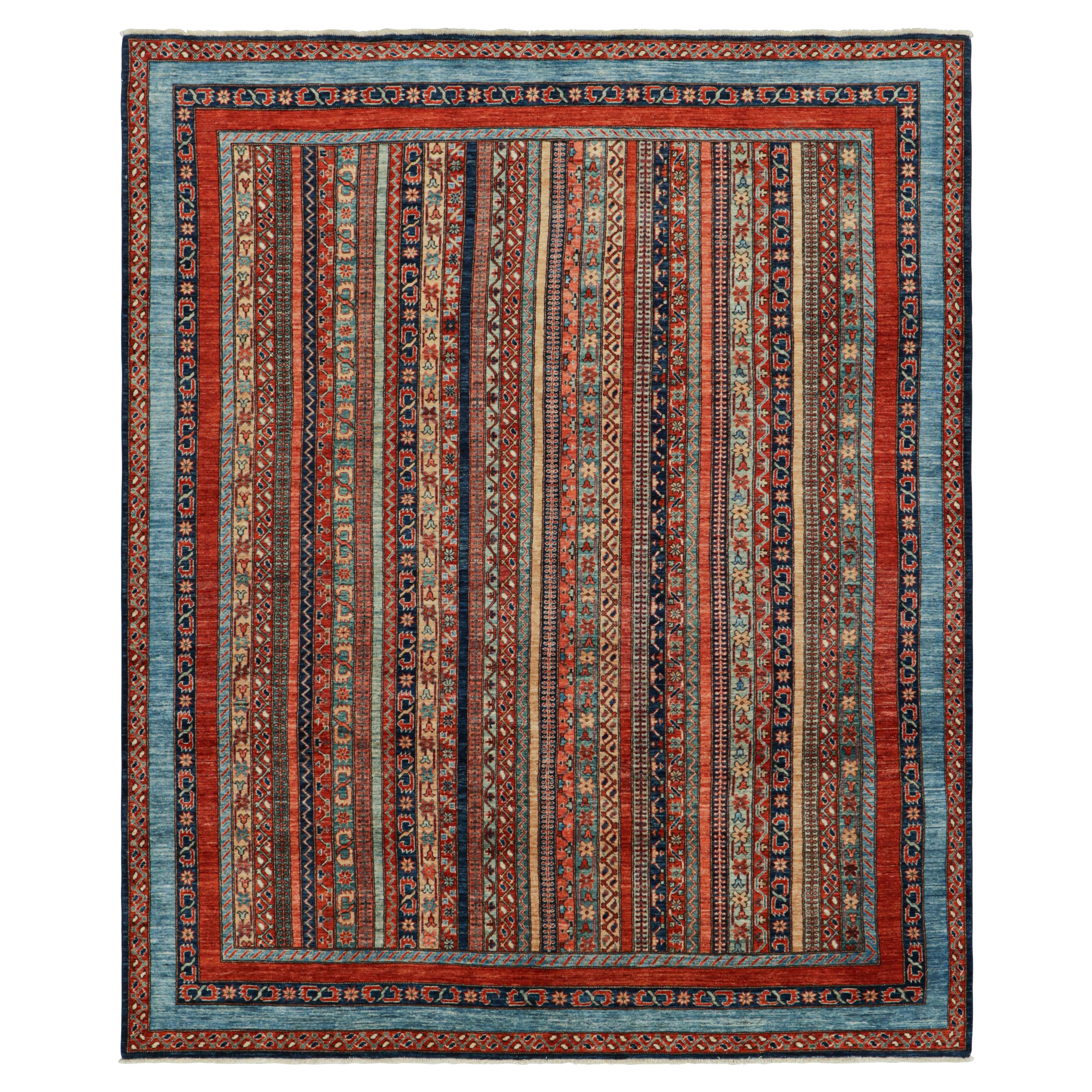 Rug & Kilim: tappeto in stile tribale con strisce multicolore e motivi floreali