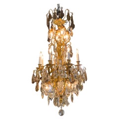 Large bronze and crystal chandelier with sixteen lights