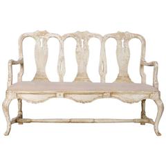 Carved French Settee or Upholstered Bench with Worn Painted Finish