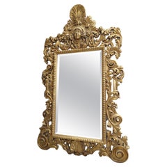 Geschnitzter vergoldeter figuraler Hollywood-Regency-Wandspiegel im italienischen Versace-Stil