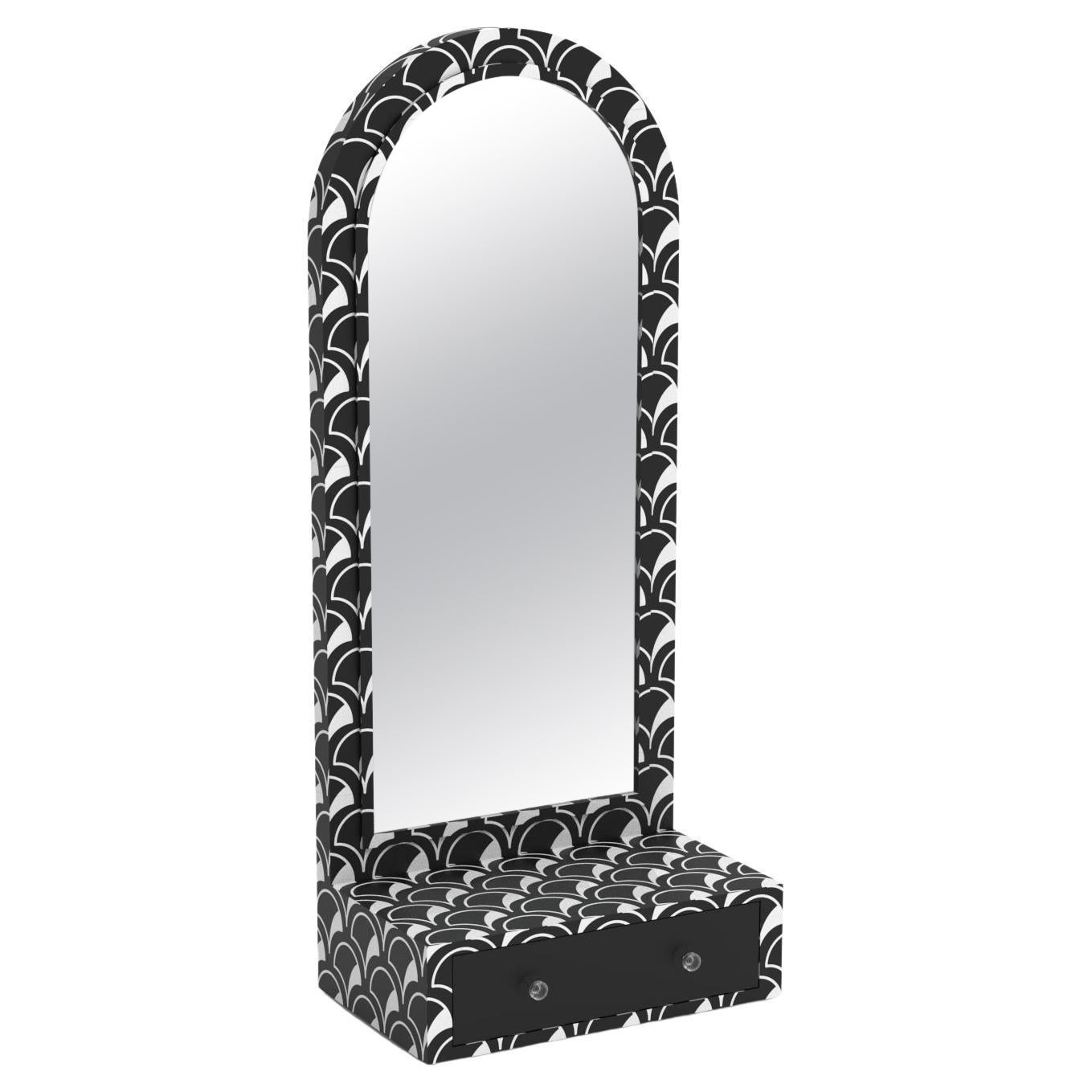Miroir de sol noir d'inspiration festonnée avec tiroir