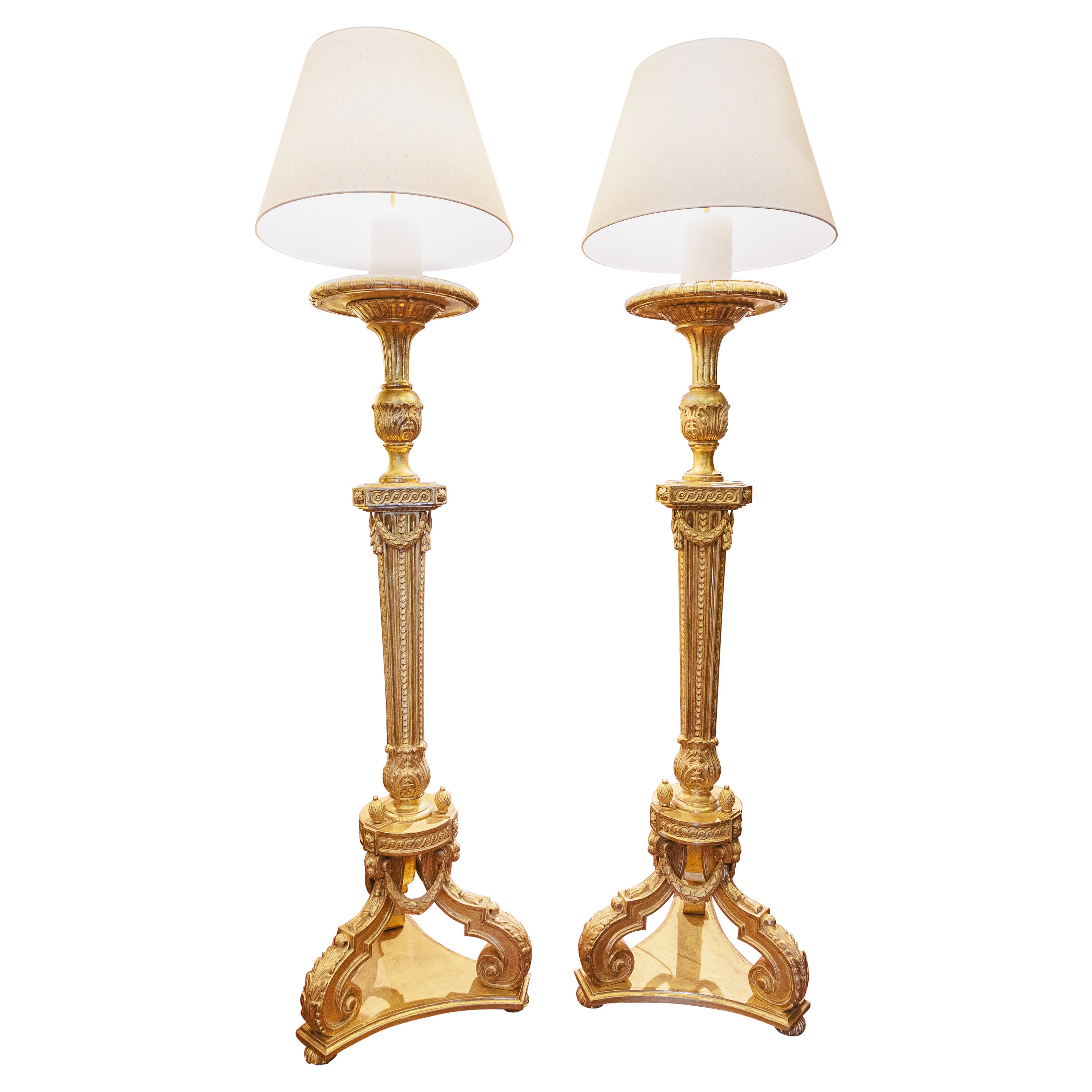 A  fine pair of 19th century George 111 gilt torchiere floor lamps For Sale