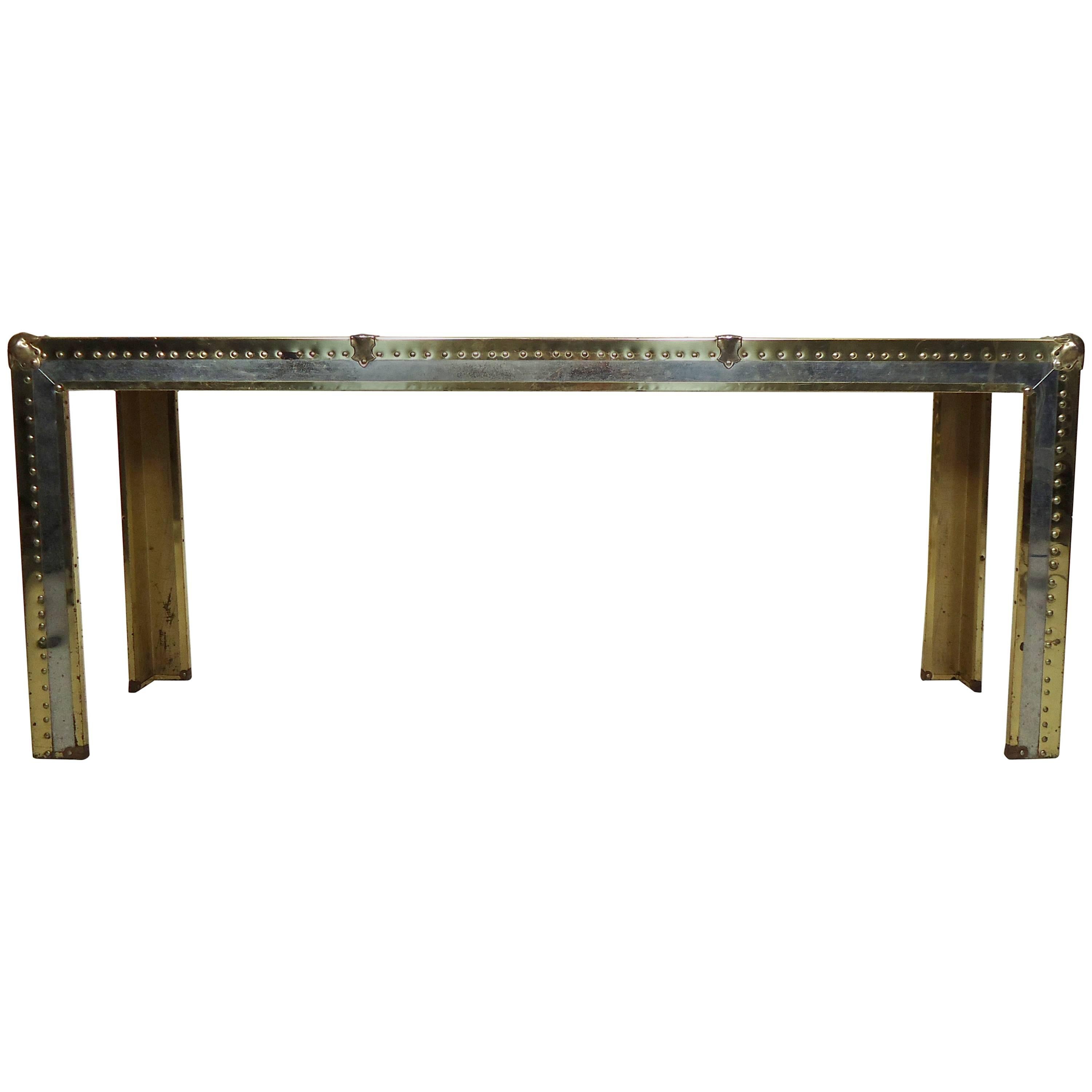 Vintage-modern console table featuring metal plating, chrome with brass accenting and exposed rivets.

Please confirm item location NY or NJ with dealer.