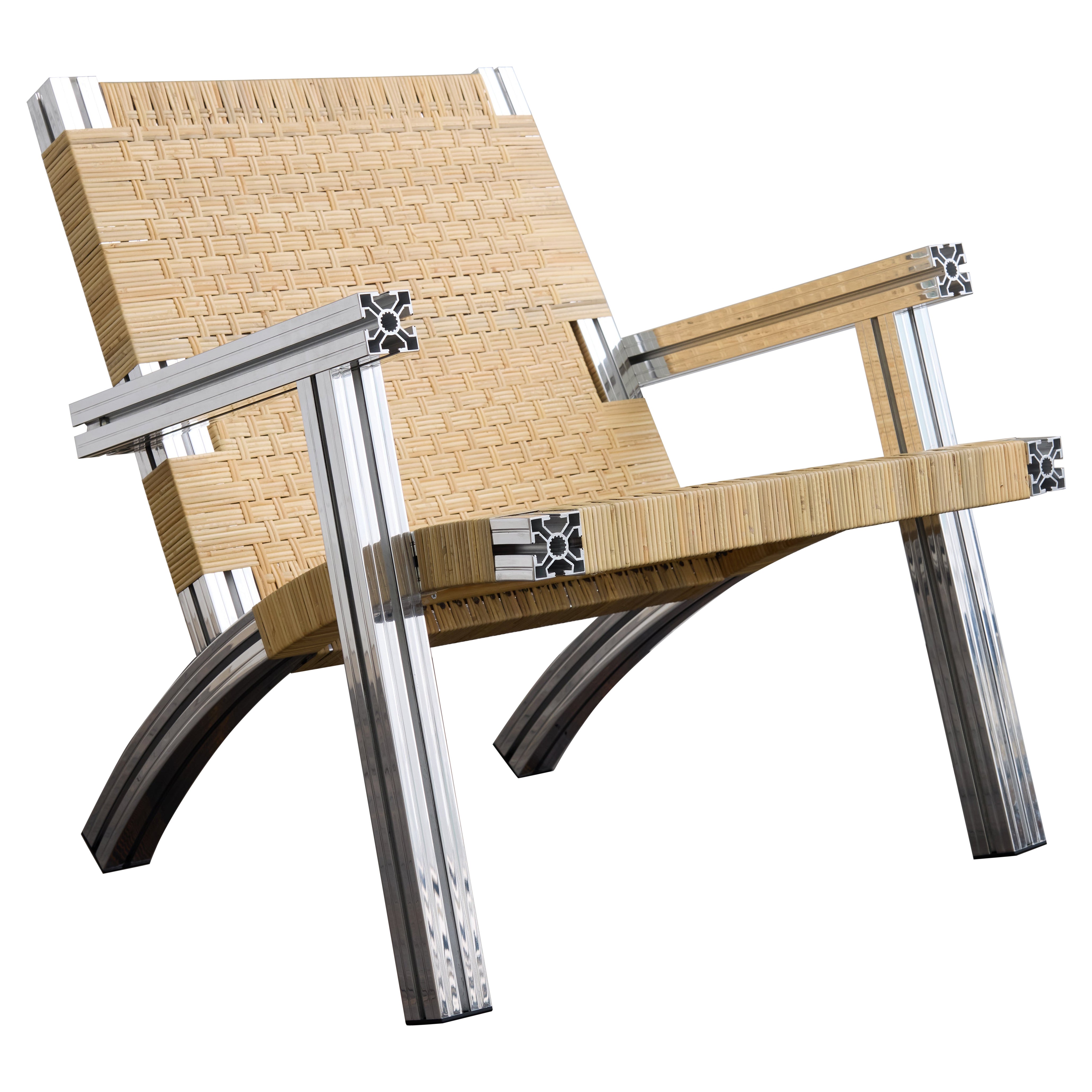 Mirror polished Aluminium Armchair with Lapping Cane Seating
