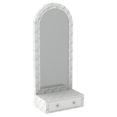 Miroir de sol blanc inspiré des festons avec tiroir