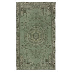 5.2x8.7 Ft Vintage Handknotted Area Rug dyed in Green Color for modern interiors