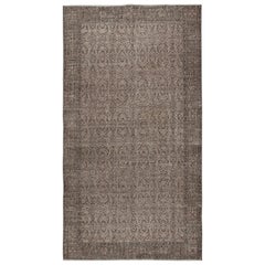 Tappeto decorativo fatto a mano di colore marrone con disegno floreale
