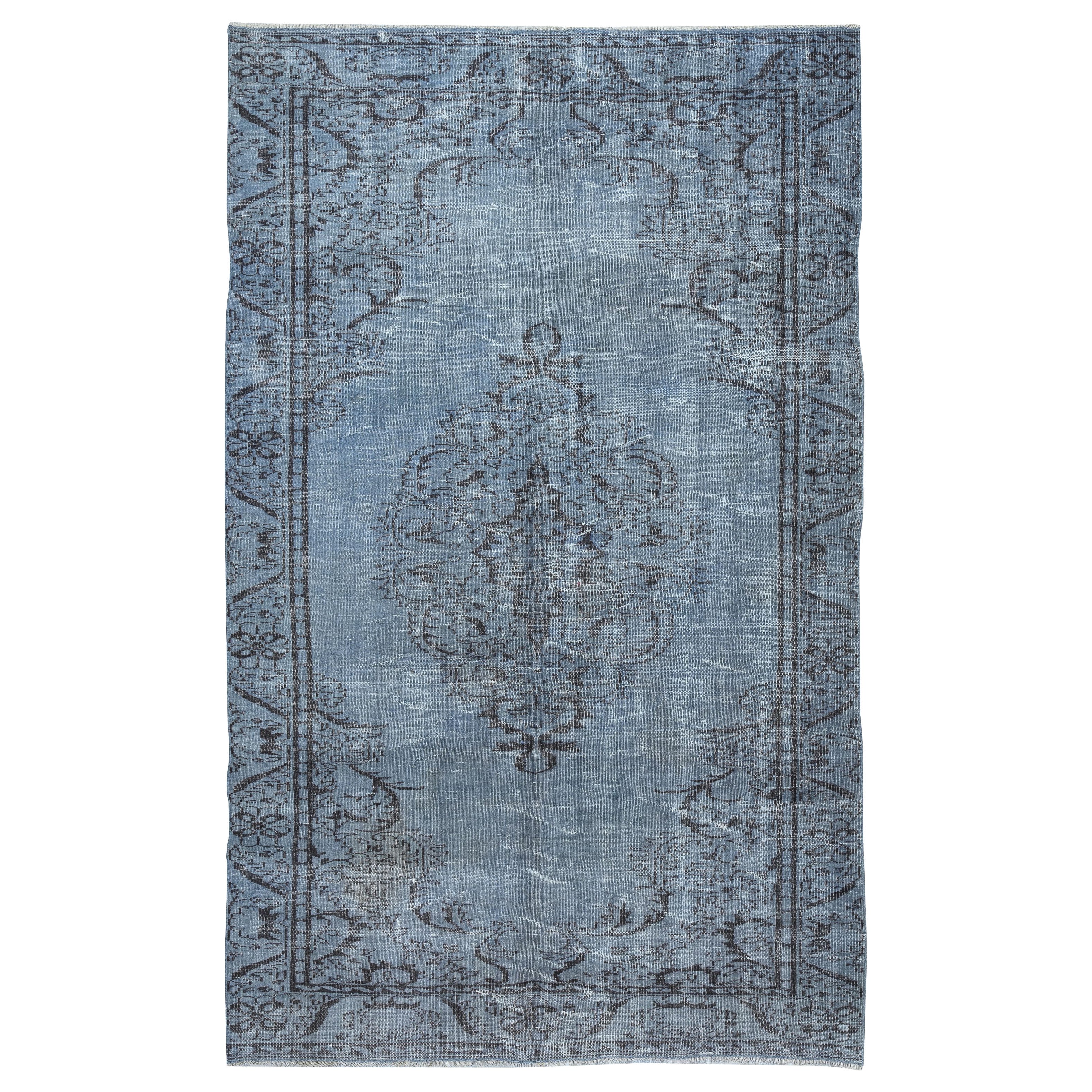 5.7x9.2 Ft Vintage Turkish Area Rug redyed in Blue Color for modern interiors